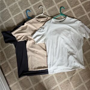 Set of Three Uniqlo Men’s T-Shirts in Black, Beige, and White